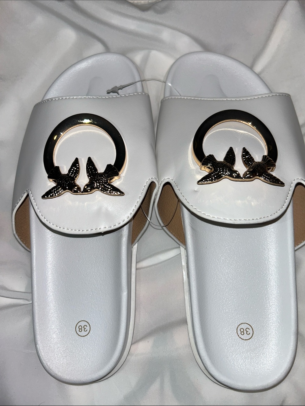Women’s White Slide Sandals with Gold Bird Accent